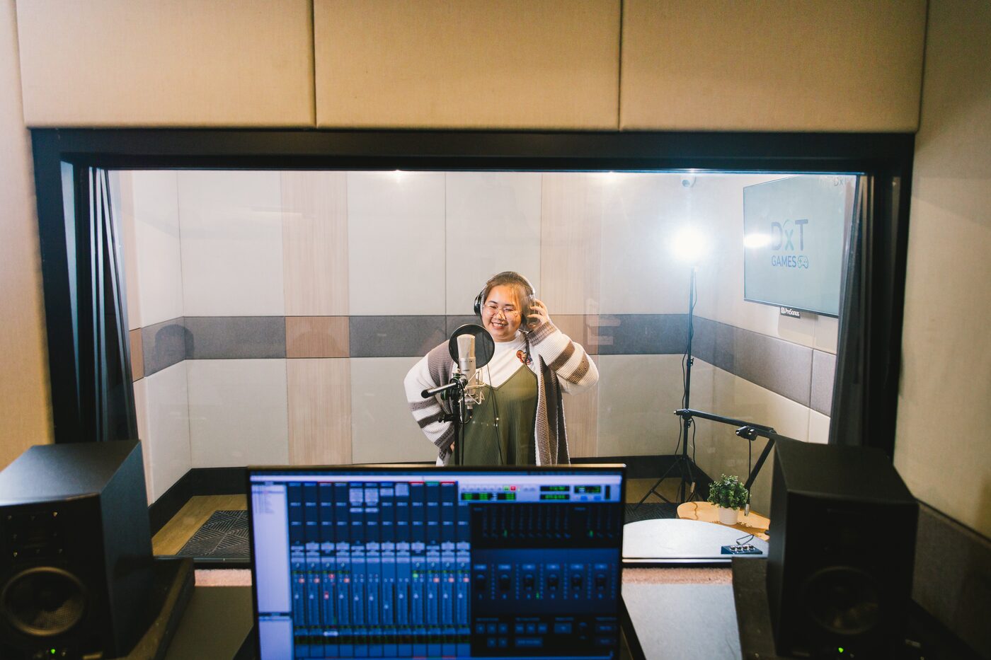 Thai voice talent recording in a DxT Games studio in Bangkok